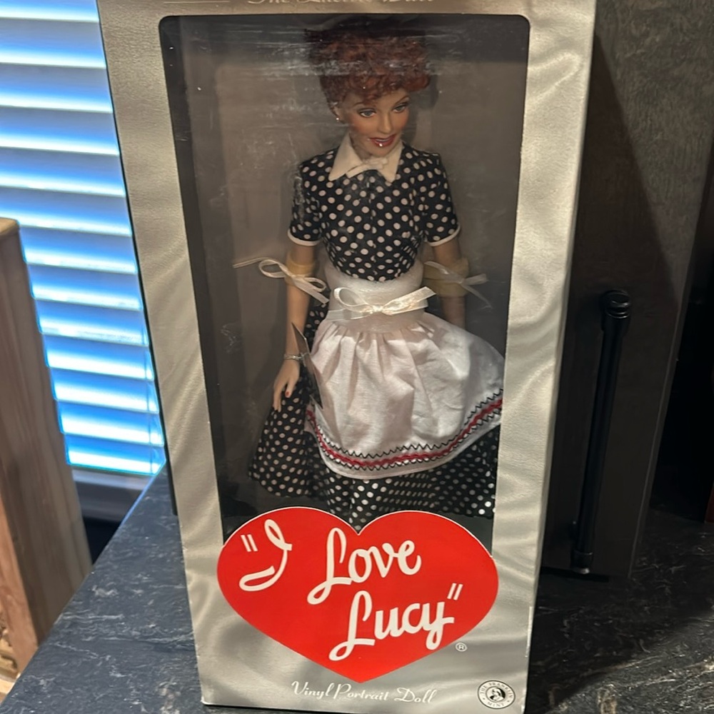 NIB. I LOVE LUCY vinyl portrait doll.